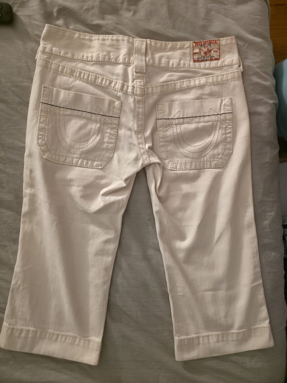 True Religion White Cropped Jeans with Signature Pocket Stitch